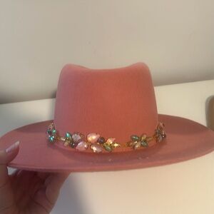 Pink hat with jeweled trim